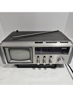 RCA Vintage 1980s Alarm Clock Radio With Built-In TV Weather Band And Telescopic
